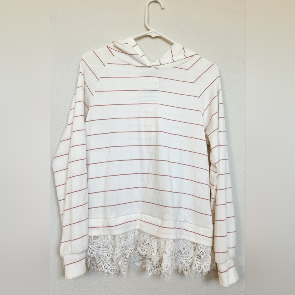 Large, white hoodie with burgundy stripes. Bottom lines with lace
